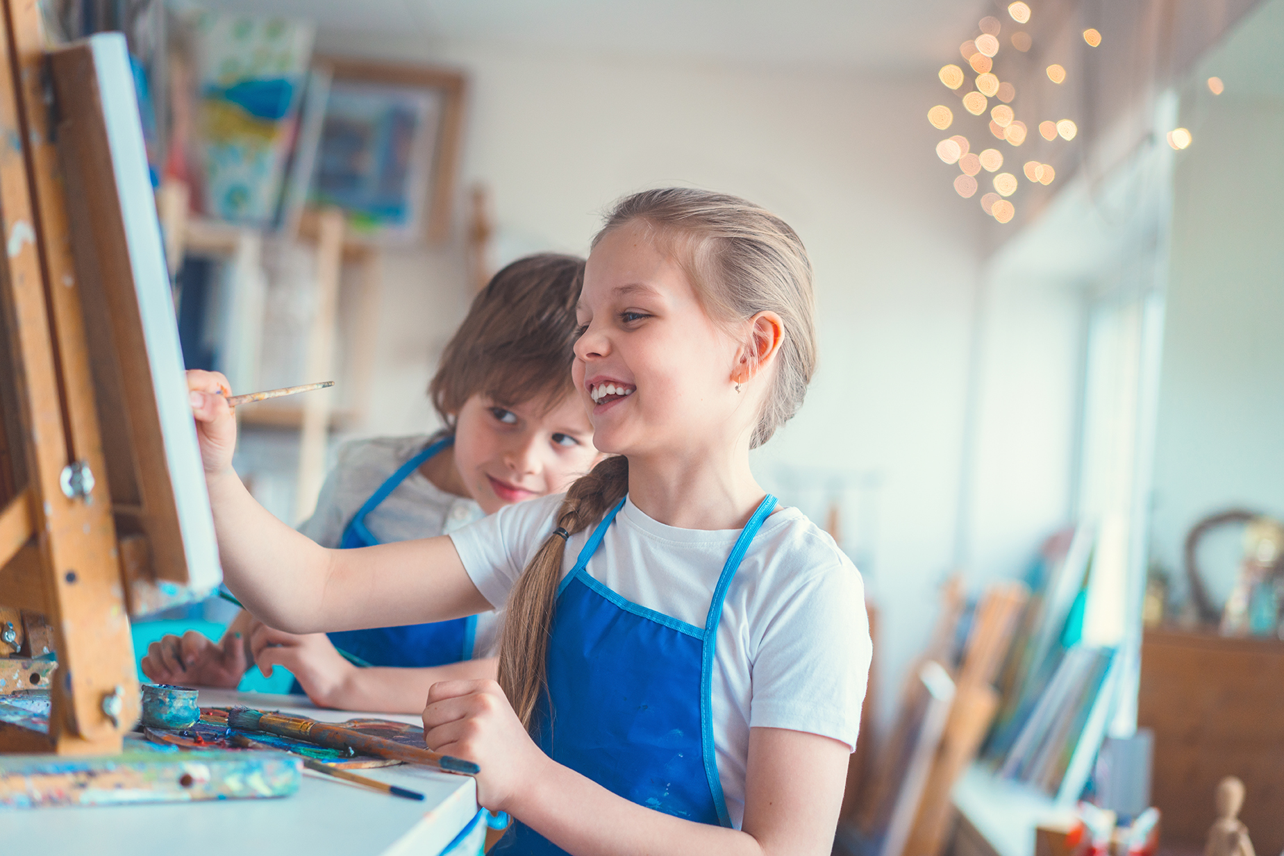 kids drawing in an art studio