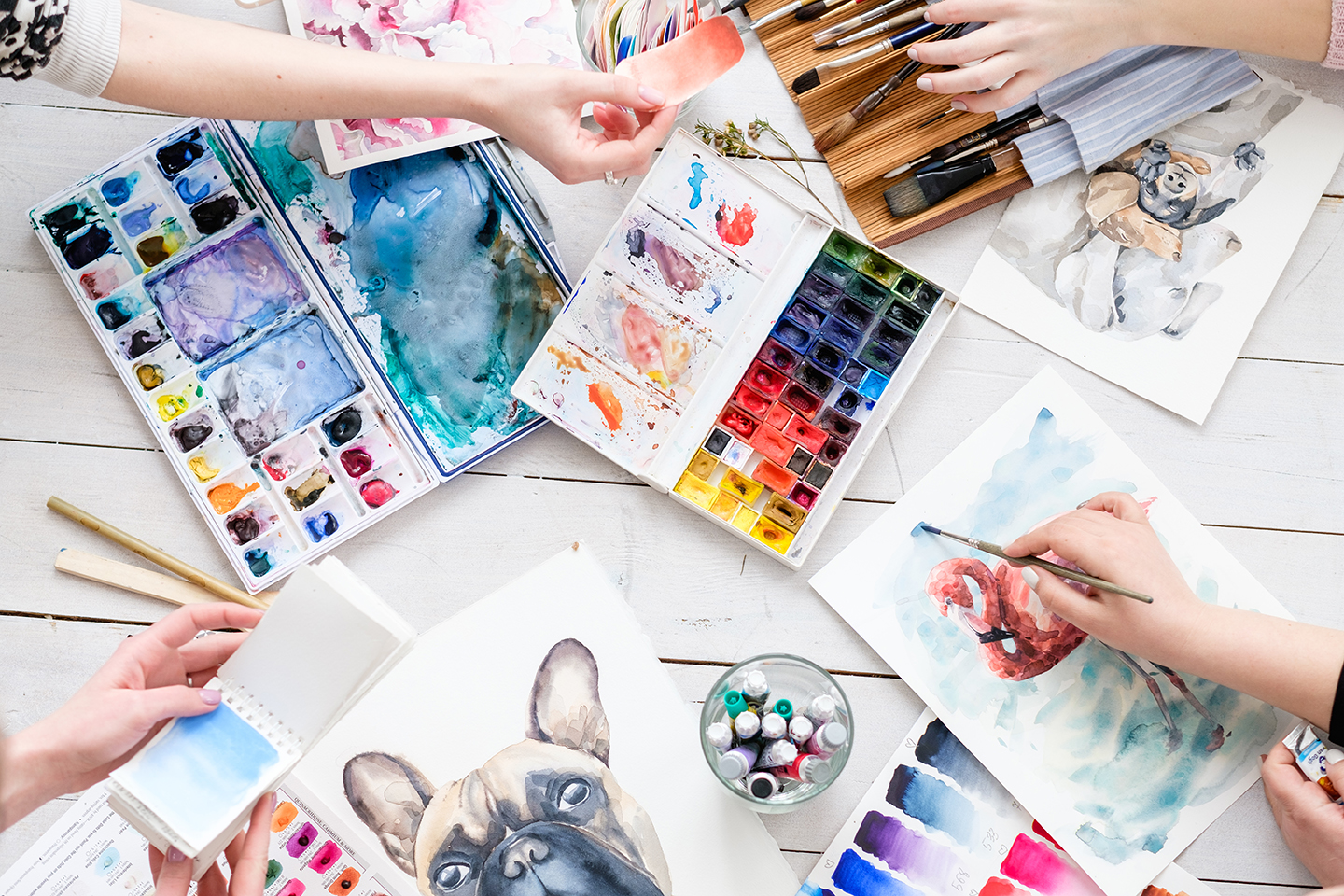 variety of painting materials on the table